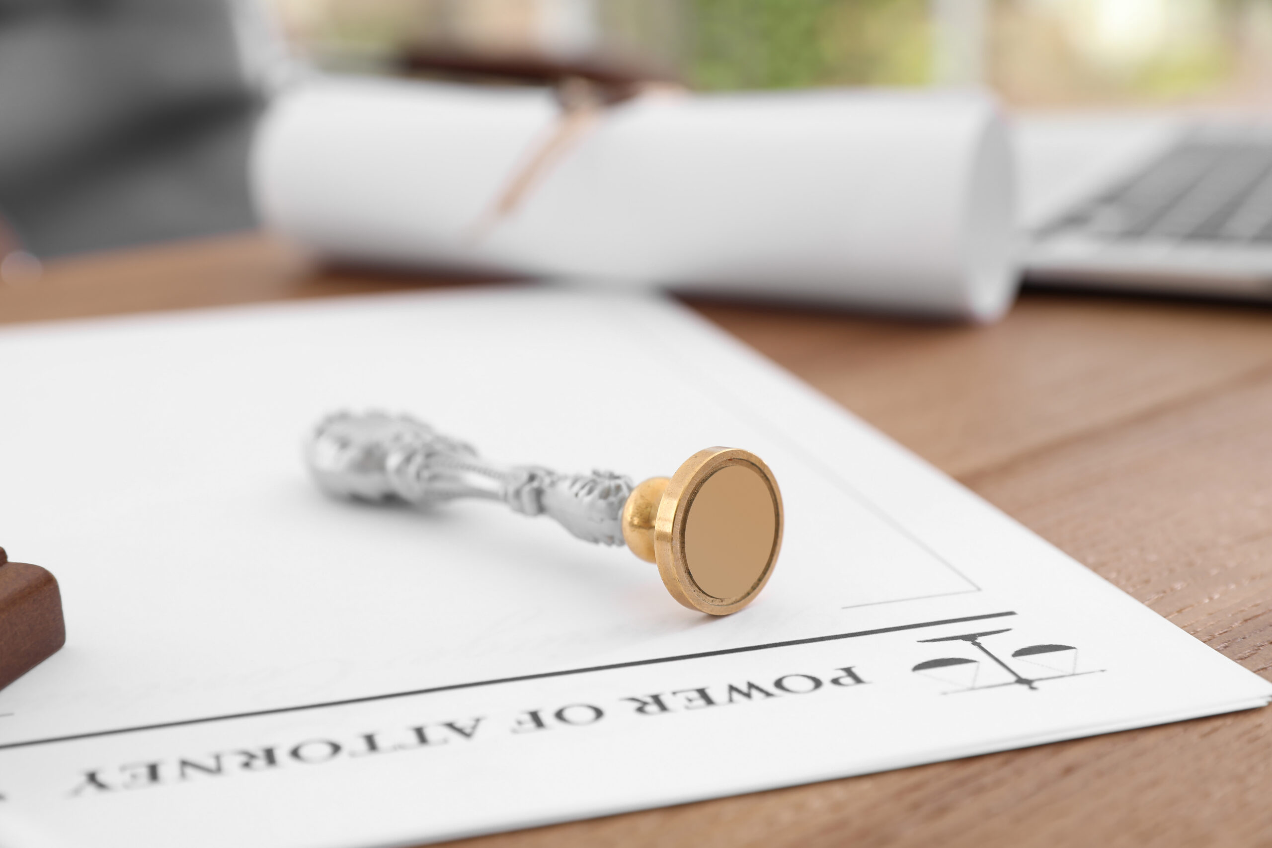 Power of attorney document with embossed legal seal